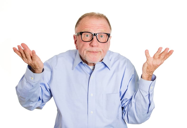 Closeup portrait, dumb clueless senior mature man, arms out asking why what's the problem who cares so what, I don't know. Isolated white background. Negative human emotion facial expression feelings.jpeg